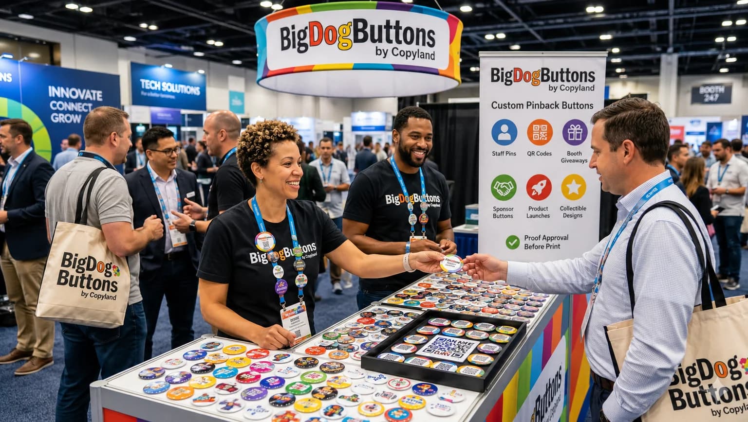 Trade show buttons displayed at a BigDogButtons booth with custom pinback samples, QR code buttons, staff pins, and booth giveaway designs.